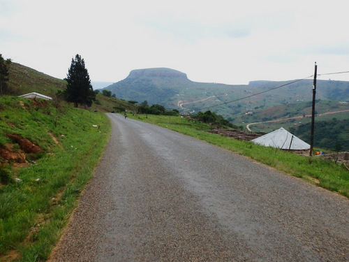 A short downhill run, a walker on the road (this is common).